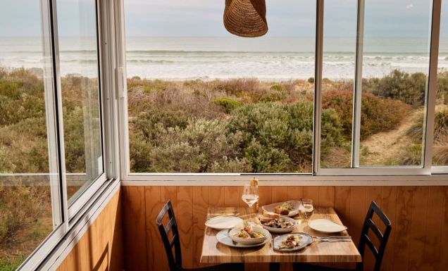 a dining setup at Kuti Shack overlooking Goolwa Beach