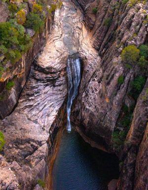 a scenic flight over a waterfall at Kakadu National Park