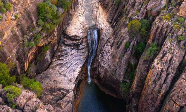 a scenic flight over a waterfall at Kakadu National Park