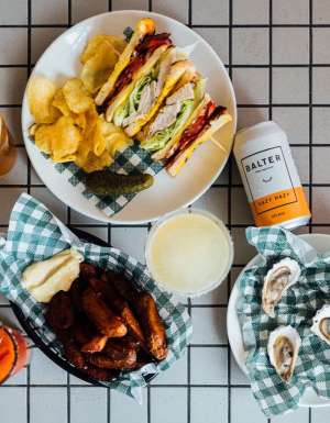 a spread of food on the table at The Clam, Lorne