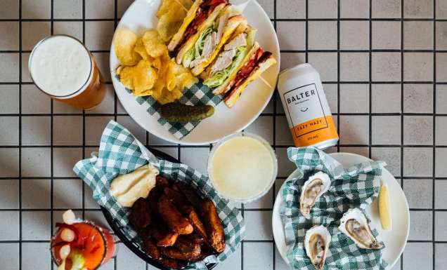 a spread of food on the table at The Clam, Lorne