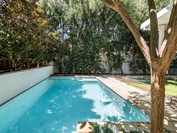 an outdoor pool at Light & Bright Villa