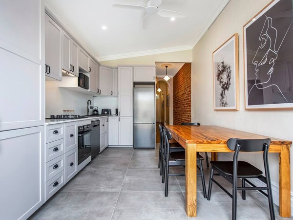 the kitchen and dining at this one bedroom terrace in Perth