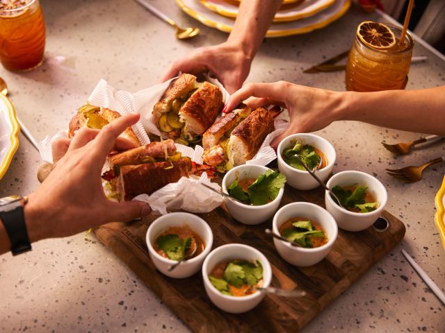 Guests enjoying food and drink at the Papa Gede's Bar Nawlins Long Lunch pop-up, Sydney CBD