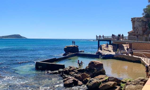 Families swimming in the rock pool at Terrigal Beach on the Central Coast