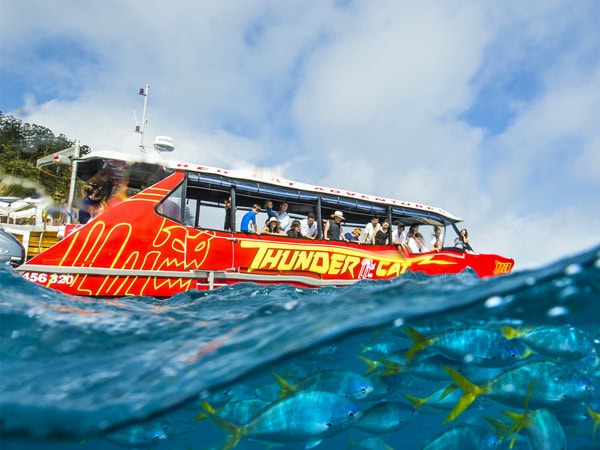 the Thundercat Whitehaven Full Day Eco-Cruise passing by the Mantaray Bay, Whitsundays