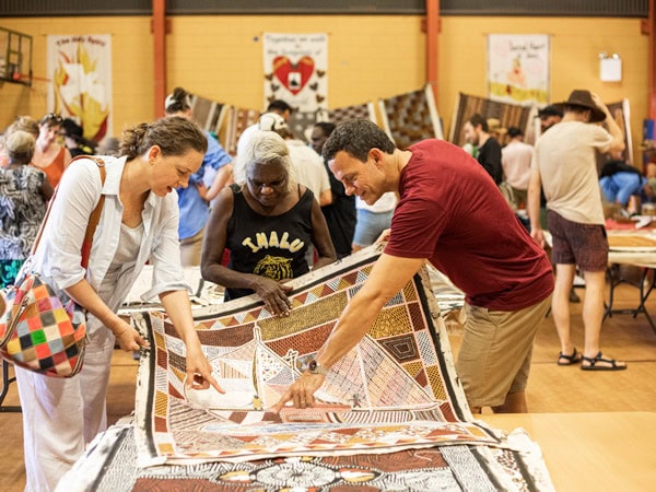 people browsing through the Tiwi Islands annual art sale
