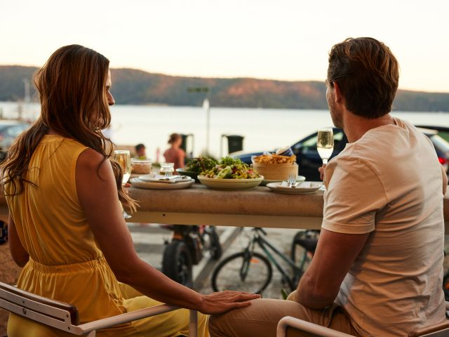 a couple enjoying lunch at The Boathouse, Patonga