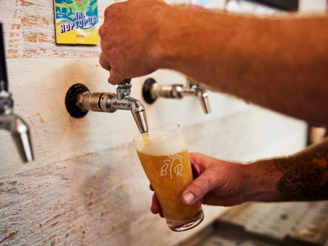 beer being poured from tap at Bay Road Brewing, Gosford