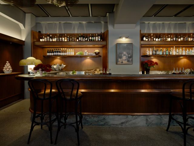 the dimly lit bar at Apollo Inn, Melbourne