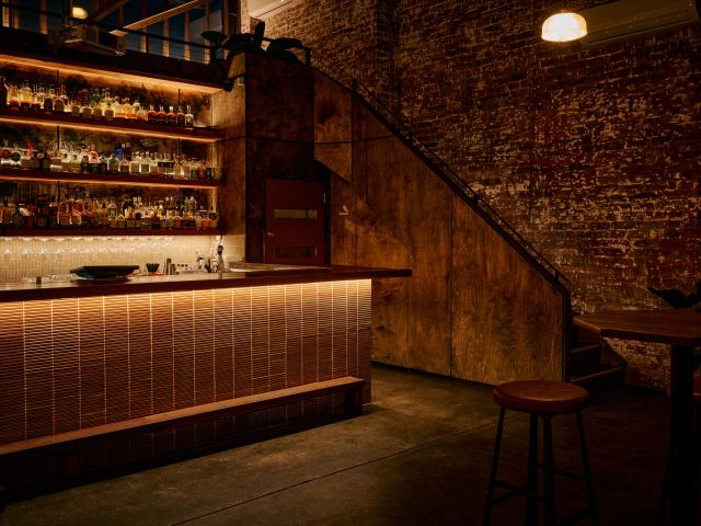 the dimly lit bar and art space at Young Hearts, Windsor