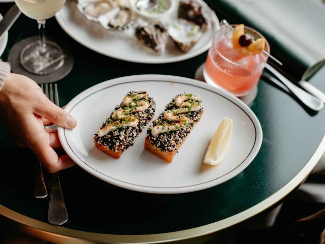 a plate of food and cocktail at Albert’s Wine Bar, Armadale