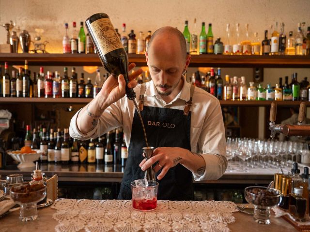a bartender mixing up a drink at Bar Olo, Melbourne