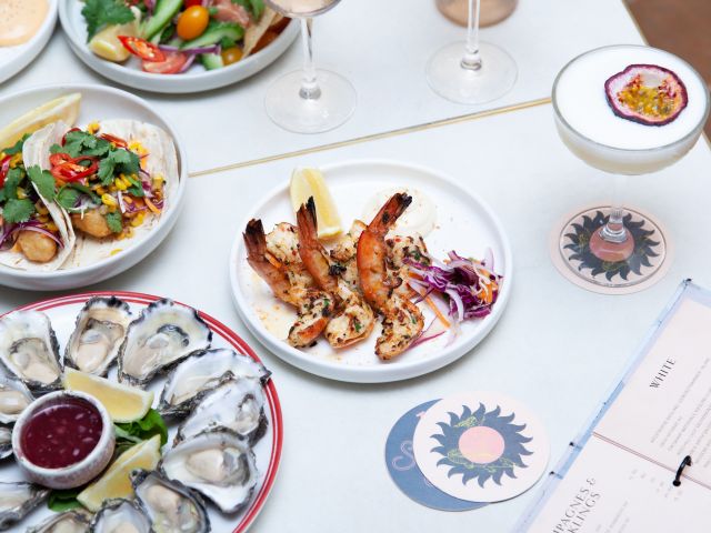 seafood dishes on the table at The Entrance Social Club, Erina