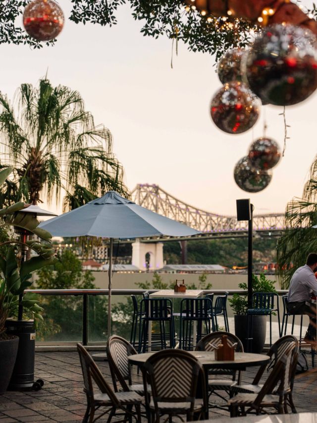 al fresco tables by the Brisbane River at Fridays