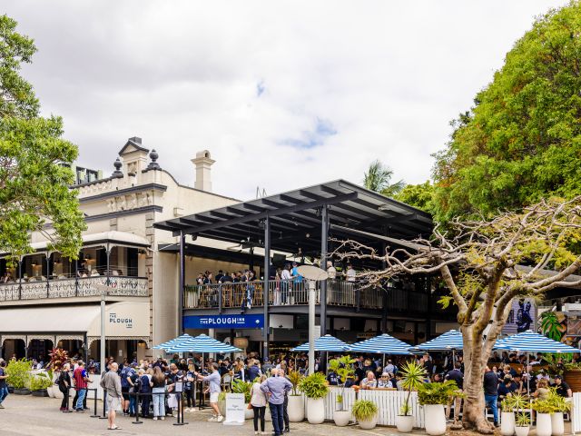 people chilling out at the beer garden of The Plough Inn, South Bank
