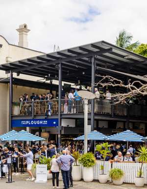 people chilling out at the beer garden of The Plough Inn, South Bank