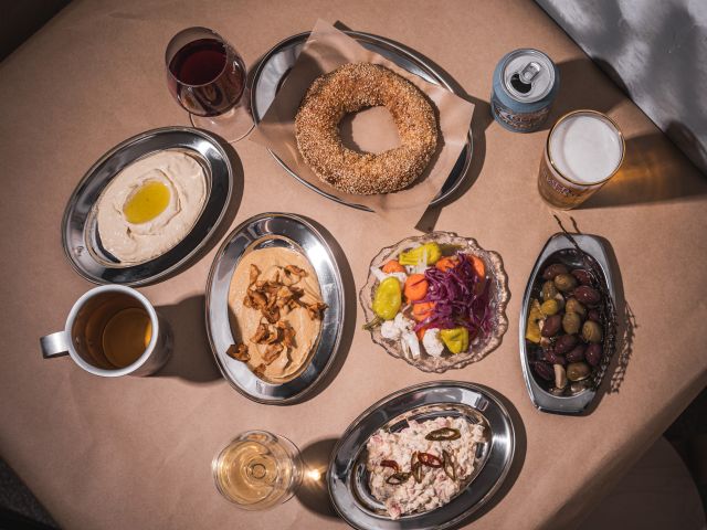 a spread of Greek dishes on the table at Homer Rogue Taverna, Cronulla