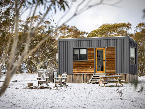 a tiny home in snow at Big Yard Escapes