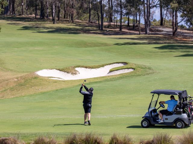 playing golf at Oaks Cypress Lakes Resort