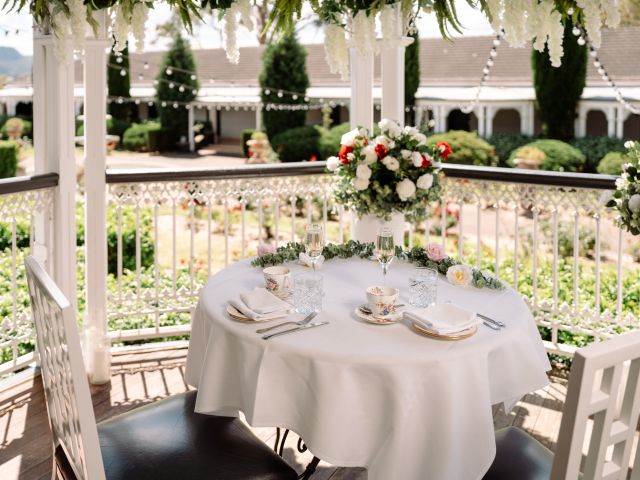 a romantic dining setup at voco Kirkton Park Hunter Valley with floral arrangement