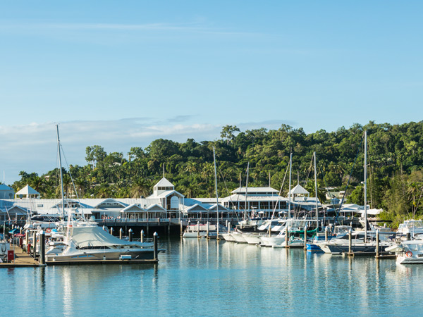 boats moored at the Crystalbrook Superyacht Marina in Port Douglas