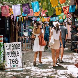 two women strolling along Kuranda Original Rainforest Markets