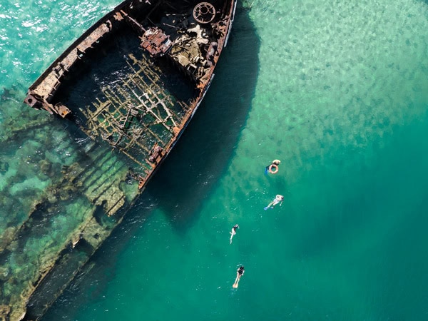 an aerial view of the Tangalooma Wrecks