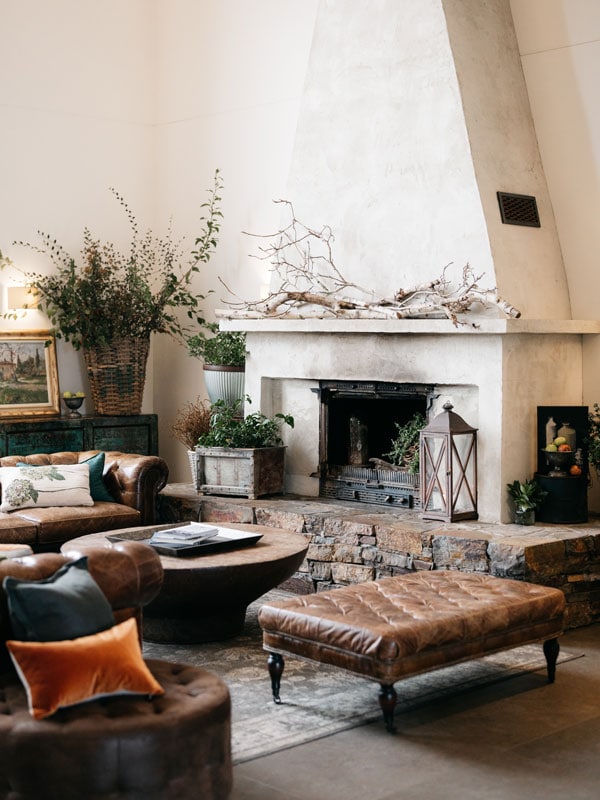 the living area with a fireplace at Farmhouse at Meletos