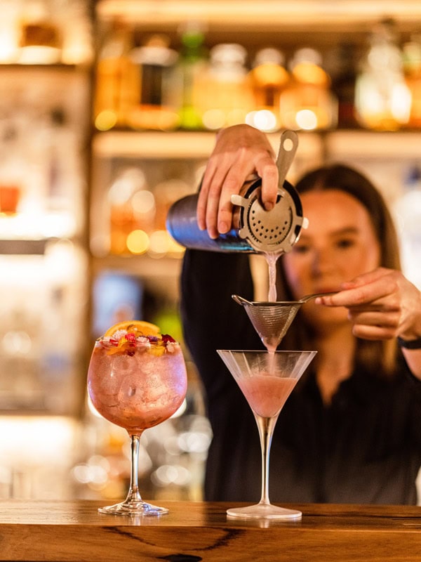 a bartender preparing cocktails at at Frolic Lane - Warrnambool