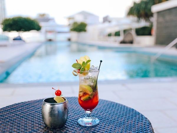 a glass of cocktail by the pool at Hilton Surfers Paradise, Gold Coast