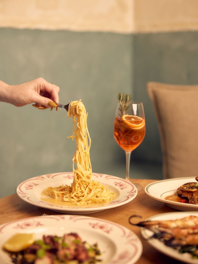 holding a fork full of pasta at Settimo Italian restaurant, Brisbane