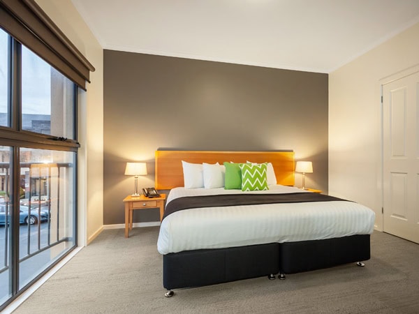 a room with a balcony at Quest Warrnambool