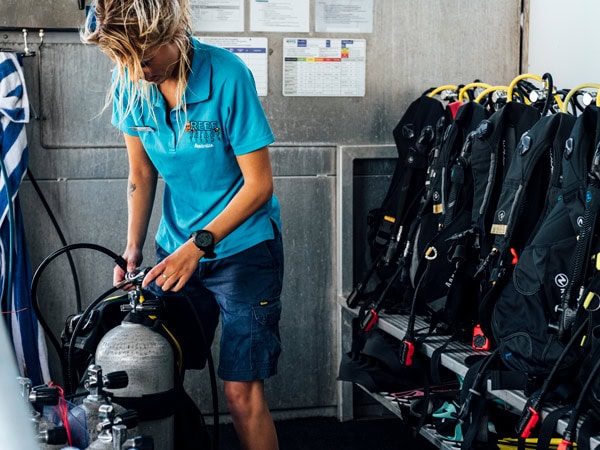 Dive instructor and gear at Reefworld