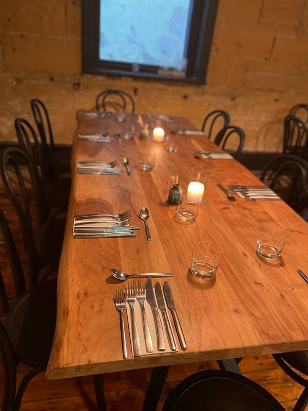 a candle-lit dinner table setup at Salt, Warrnambool