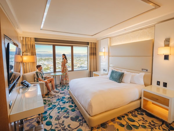 a couple facing each other inside one of the suites at The Star Grand, Gold Coast