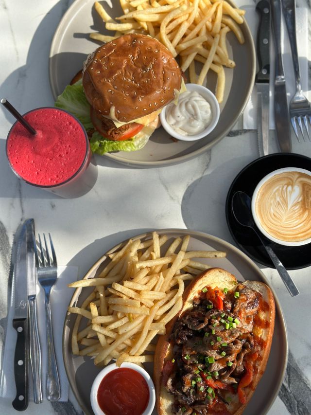 generous breakfast plates with coffee and juice at Cafe Melograno, Perth