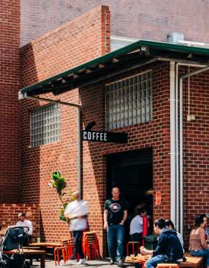 people dining outside Community Coffee Co, Perth