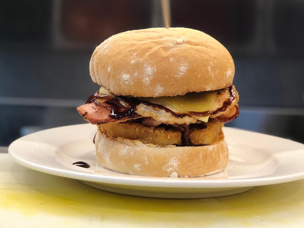 a breakfast burger at Happy Place, Townsville
