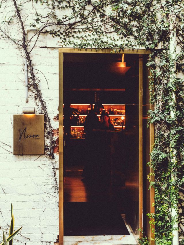 a vine-covered alley leading to The Nixon Room, Fortitude Valley