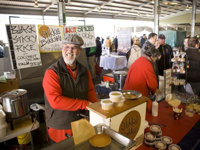 a stall owner at Capital Region Farmers Market