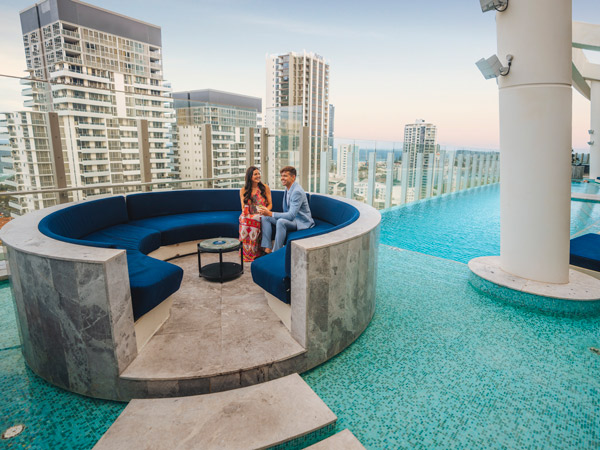 a couple relaxing at Nineteen at the Star lounge bar, Broadbeach