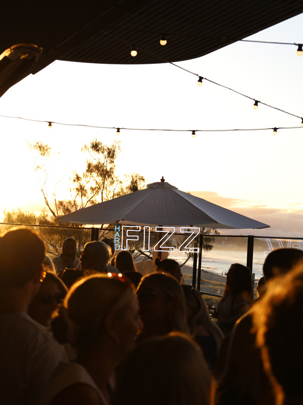 people gathering at sunset to drink at Hard Fizz Taproom, Burleigh Heads