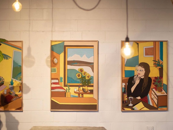 art on display inside Dust Temple cafe, Gold Coast