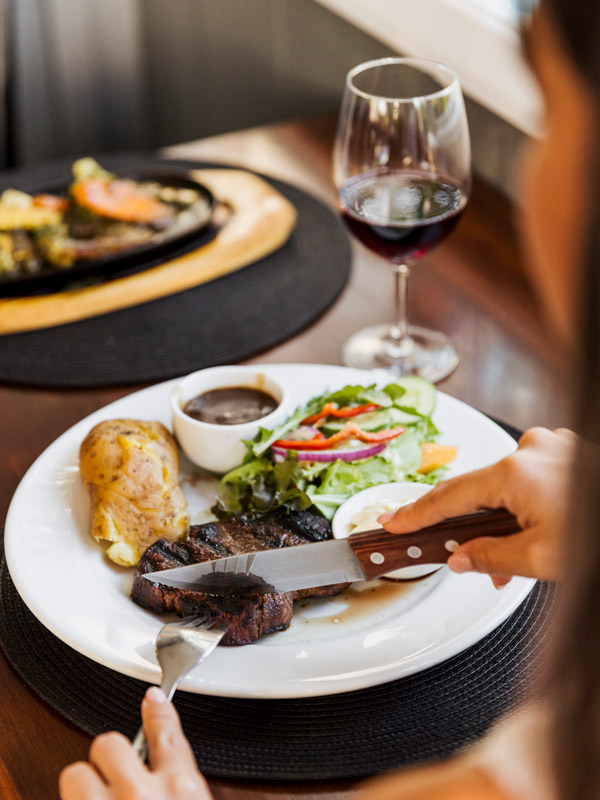 a steak dinner at Bounty Bar & Grill, Norfolk Island