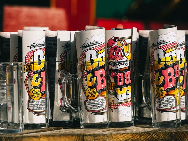 Close up of glass and guide at Adelaide Beer and BBQ fest