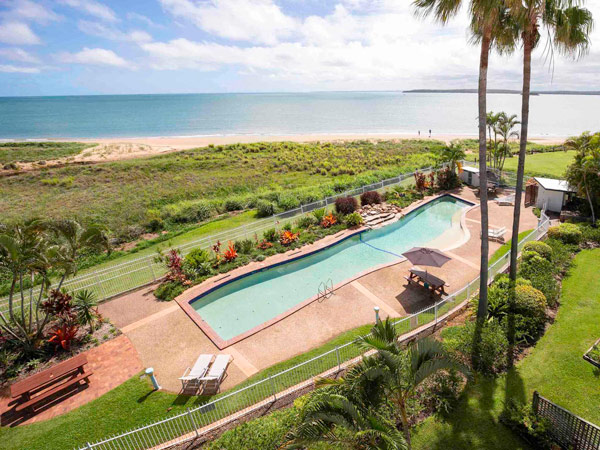 the pool and beach as seen from above, BreakFree Great Sandy Straits Hervey Bay