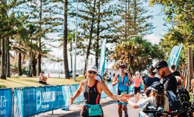Woman running in the Mooloolaba Triathlon on the Sunshine Coast