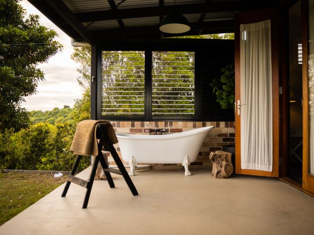 an outdoor tub at Thirlestone Farm Cottage and Barn