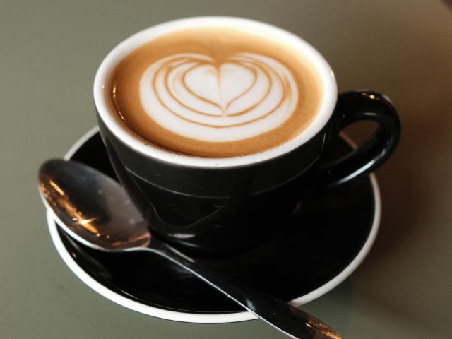 a latte cup at The Coffee Noosa